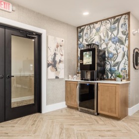 a room with a tv and cabinets